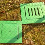 manhole cover impact protectors