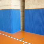 Gymnasium wall protections, sports facility safety protections